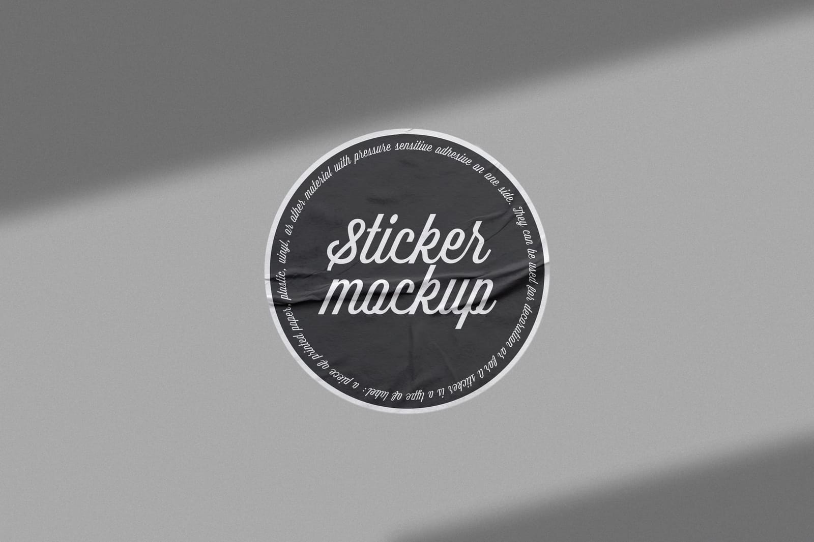 Centered Black Script Sticker Mockup