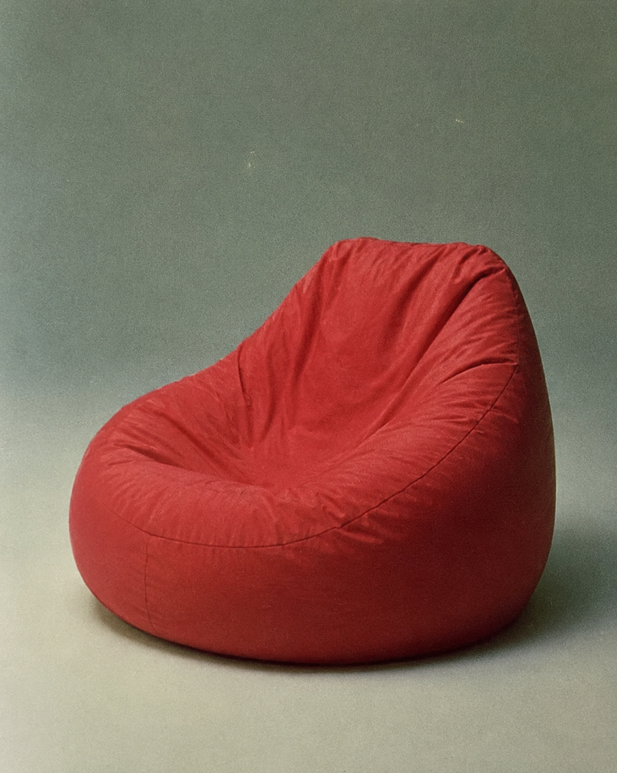 Red Bean Bag Chair On Neutral Backdrop